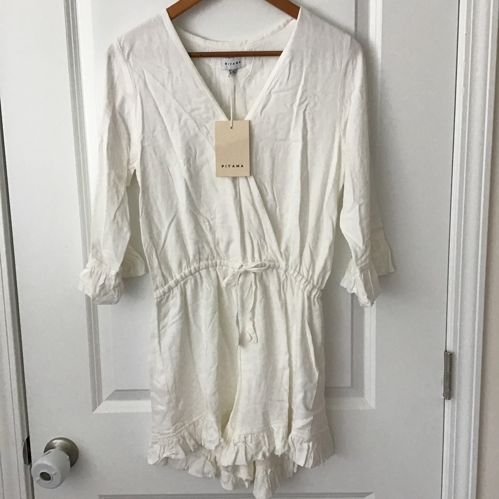 NWT! Size small ivory PIYAMA romper with ruffle details Vneck 3/4 sleeves